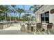 Enclosed pool area offering shade, a built-in grill, and outdoor dining at 4741 Pinnacle Dr, Bradenton, FL 34208