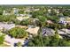 This home boasts lush landscaping and a private screened-in pool at 4915 Old Tree Pl, Sarasota, FL 34233
