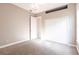 This simple bedroom has a window for natural light and a closet for storage at 4915 Old Tree Pl, Sarasota, FL 34233