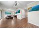 Open concept living area with hardwood floors, modern decor, and ample space for entertaining at 5522 Cartagena Dr, Sarasota, FL 34233
