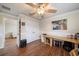This office features wood floors, a ceiling fan, and a large closet at 5522 Cartagena Dr, Sarasota, FL 34233