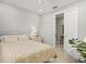 Bright bedroom featuring neutral walls and ceiling fan at 5590 Rain Lily Ct, Sarasota, FL 34238