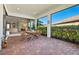 Enjoy views from this screened patio overlooking backyard, connected to indoor living space at 5590 Rain Lily Ct, Sarasota, FL 34238