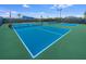 Well-maintained community tennis courts, offering residents a place for recreation at 5590 Rain Lily Ct, Sarasota, FL 34238