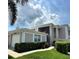Charming two-story home with landscaped yard and attached garage in a peaceful setting at 5647 Sheffield Greene Cir # 29, Sarasota, FL 34235