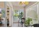 Cozy lanai with tropical views and seating at 5647 Sheffield Greene Cir # 29, Sarasota, FL 34235