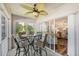 Relaxing outdoor dining on the screened lanai at 5647 Sheffield Greene Cir # 29, Sarasota, FL 34235