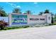 Welcome to Wellen Park depicted by an entrance sign showcasing a vibrant community and recreational amenities at 568 Sheridan Dr, Venice, FL 34293