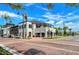Stylish commercial building with a brick-paved entrance and well-maintained landscaping, ideal for retail or office space at 568 Sheridan Dr, Venice, FL 34293