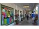 Charming downtown shopping district with vibrant storefronts, pedestrian traffic, and Island Gift Nook sign at 568 Sheridan Dr, Venice, FL 34293