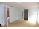 Comfortable bedroom featuring a ceiling fan, and mirrored closet doors at 6309 35Th W Ave, Bradenton, FL 34209