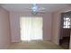 Versatile living space with neutral walls and sliding doors leading to the lanai at 6309 35Th W Ave, Bradenton, FL 34209