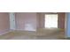 Spacious living area with a sliding glass door offers seamless access to the outdoors at 6309 35Th W Ave, Bradenton, FL 34209