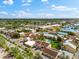 Community aerial view showcasing lush landscaping, community pool, and convenient location at 6348 7Th W Ave # 6348, Bradenton, FL 34209