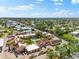 Aerial view of community featuring attractive condo buildings and a sparkling community pool at 6348 7Th W Ave # 6348, Bradenton, FL 34209