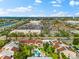 Scenic aerial view of condo community with community pool, convenient access to retail, and ample parking at 6348 7Th W Ave # 6348, Bradenton, FL 34209