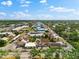 Lovely aerial view of a well-maintained condo community with mature trees and convenient parking spaces at 6348 7Th W Ave # 6348, Bradenton, FL 34209