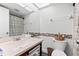 Bathroom featuring a vanity with a large mirror and a walk-in shower at 6348 7Th W Ave # 6348, Bradenton, FL 34209