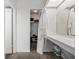 Hallway with closet, vanity area, mirror, and additional storage space at 6348 7Th W Ave # 6348, Bradenton, FL 34209