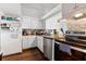Efficient kitchen features stainless steel appliances, modern countertops, and ample cabinet space for storage at 6348 7Th W Ave # 6348, Bradenton, FL 34209