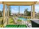 Screened in patio overlooking the community pool and lush landscaping at 6348 7Th W Ave # 6348, Bradenton, FL 34209