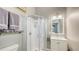 Cozy bathroom featuring glass door shower, modern vanity, and neutral decor at 640 N Osprey Ave, Sarasota, FL 34236