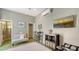 Cozy bedroom with a view of the outdoor patio and an ensuite bathroom at 640 N Osprey Ave, Sarasota, FL 34236