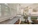 Counter and cabinetry in the kitchen and dining area with natural light from shuttered windows at 640 N Osprey Ave, Sarasota, FL 34236