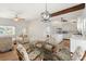Bright and airy living room and kitchen featuring an open floor plan, modern decor, and ample space at 6715 Georgia Ave, Bradenton, FL 34207