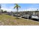 Community marina features docks, boats and a palm tree at 6715 Georgia Ave, Bradenton, FL 34207