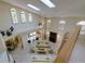 Bright living room with skylights and open floor plan at 7340 Villa D Este Drive, Sarasota, FL 34238