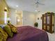 Beautiful main bedroom with a ceiling fan, walk in closet and en-suite bathroom at 7340 Villa D Este Drive, Sarasota, FL 34238