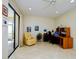 Spacious office area with tile floors, lots of natural light and a desk at 7340 Villa D Este Drive, Sarasota, FL 34238