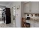Convenient office nook with custom cabinets and granite countertop at 7340 Villa D Este Drive, Sarasota, FL 34238