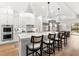Contemporary kitchen with stainless steel appliances and a large island at 8163 Redonda Loop, Lakewood Ranch, FL 34202