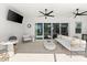 Relaxing lanai space with ceiling fans, comfortable seating, and pool views at 8163 Redonda Loop, Lakewood Ranch, FL 34202