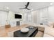 Second floor living room features a wet bar, comfortable seating, and modern decor at 8163 Redonda Loop, Lakewood Ranch, FL 34202