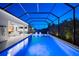 The screened in lanai with a pool provides a refreshing and private retreat for relaxation and outdoor enjoyment at 8163 Redonda Loop, Lakewood Ranch, FL 34202