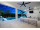 This spacious screened lanai with a pool, spa, and seating area is perfect for entertaining guests or relaxing at 8163 Redonda Loop, Lakewood Ranch, FL 34202