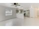 Open concept kitchen with stainless steel appliances, tile flooring, and breakfast bar at 838 31St E Ave, Bradenton, FL 34208