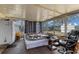 Bright sun room with large windows, a model train and track at 8718 Gaillard Ave, North Port, FL 34287