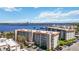Aerial view of the condos building with water view and marina in the background at 1650 1St W Ave # 503B, Bradenton, FL 34205