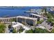 Aerial view of the condos building with water view and marina in the background at 1650 1St W Ave # 503B, Bradenton, FL 34205
