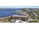 Aerial view of the condos building with water view and marina in the background at 1650 1St W Ave # 503B, Bradenton, FL 34205