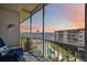 Screened balcony offering water views, complemented by outdoor seating and a cozy atmosphere at 1650 1St W Ave # 503B, Bradenton, FL 34205