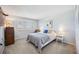 Cozy bedroom featuring a comfortable bed, serene decor, and ample natural light from the window at 1650 1St W Ave # 503B, Bradenton, FL 34205