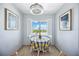 Cozy breakfast nook with bright window views and shuttered windows at 1650 1St W Ave # 503B, Bradenton, FL 34205