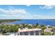 Top-down exterior shot featuring a multi-story condo and serene bay views at 1650 1St W Ave # 503B, Bradenton, FL 34205