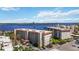Waterfront condo building with well-maintained landscaping and ample parking, offering stunning water views and coastal living at 1650 1St W Ave # 503B, Bradenton, FL 34205