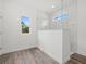 Contemporary bathroom featuring a walk-in shower with glass enclosure and marble-look tile accents at Lot 20 Garafola Ave, North Port, FL 34291